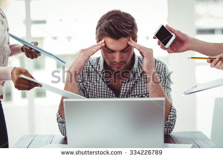 stock-photo-businessman-stressed-out-at-work-in-casual-office-334226789